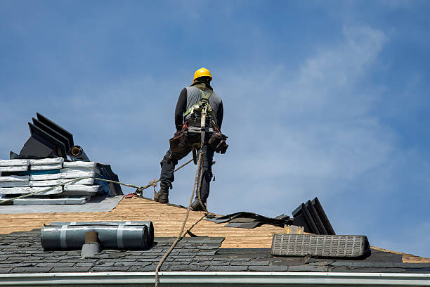 Professional Roof Replacement technician working in Centuria, WI